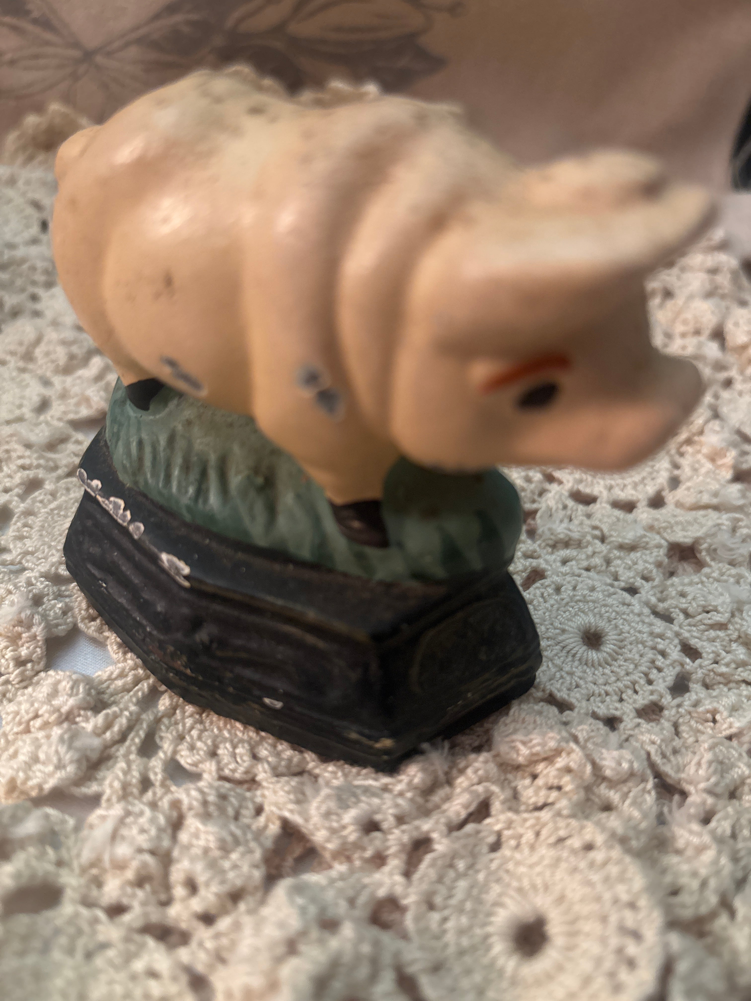 Vintage cast iron small door stopper baby pig