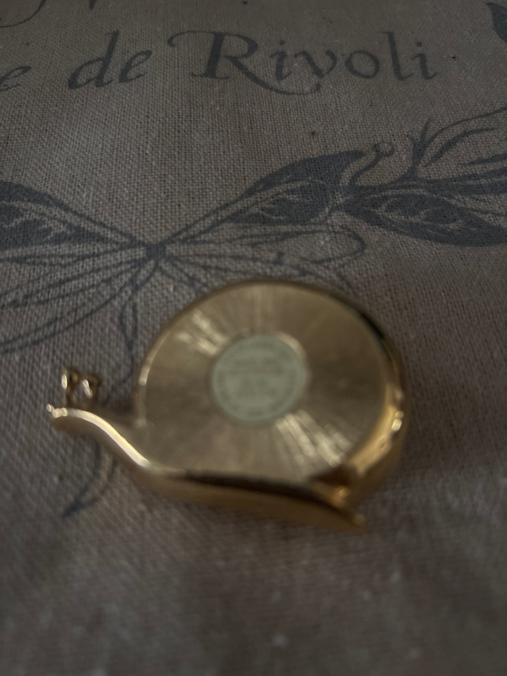 Vintage Estée Lauder Lucky Snail Solid White Linen Perfume Compact.