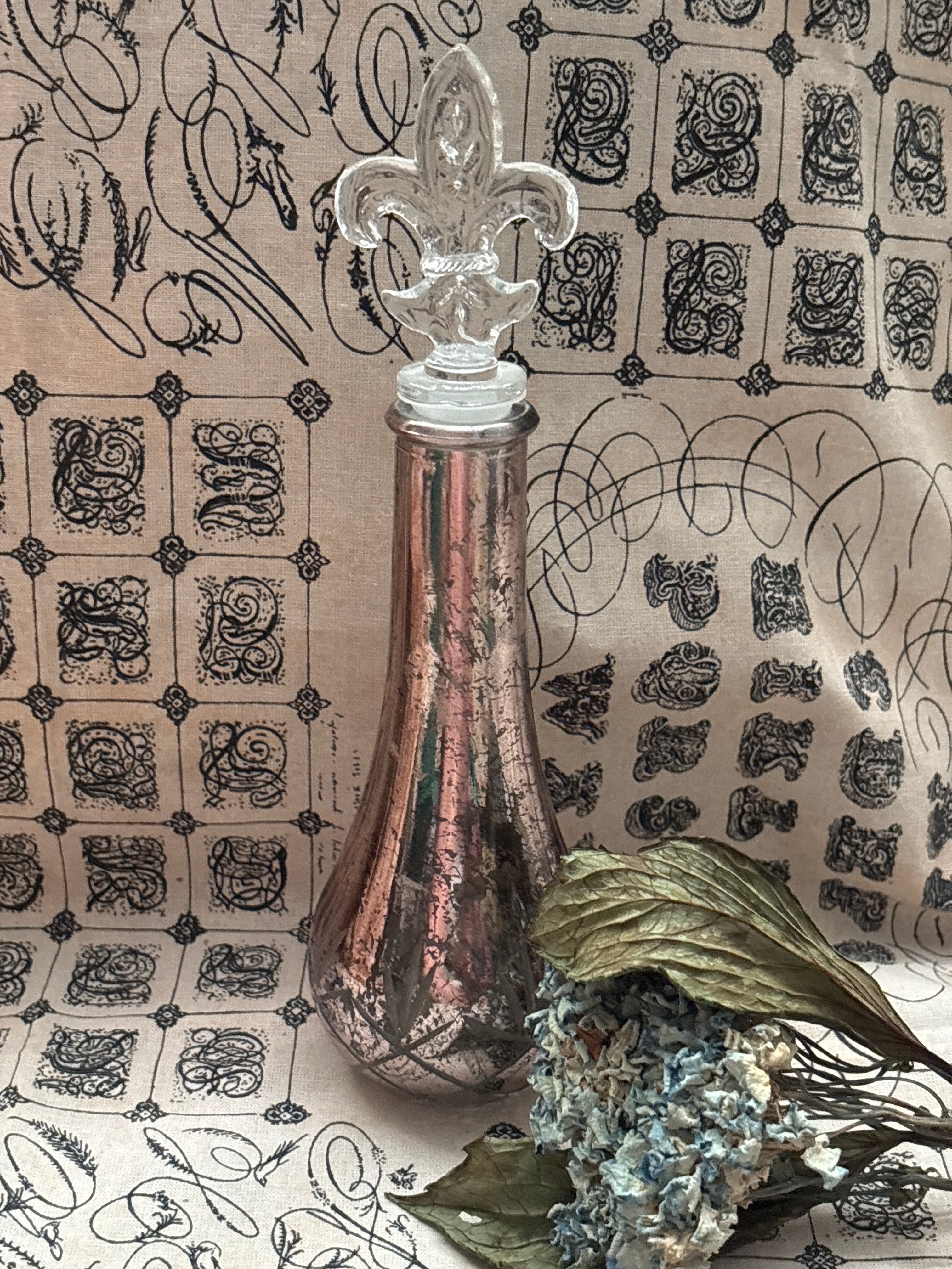 French Fleur De Lis Stoppers  Mercury Ribbed Glass Bottle